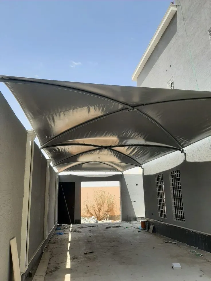اصلاح مظلات كراج مقوسة بتثبيت آمن في خميس مشيط وجيزان